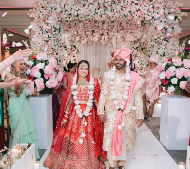 a man and woman in traditional indian attire