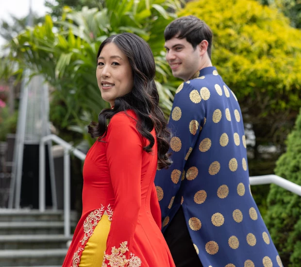 a man and woman in traditional dress