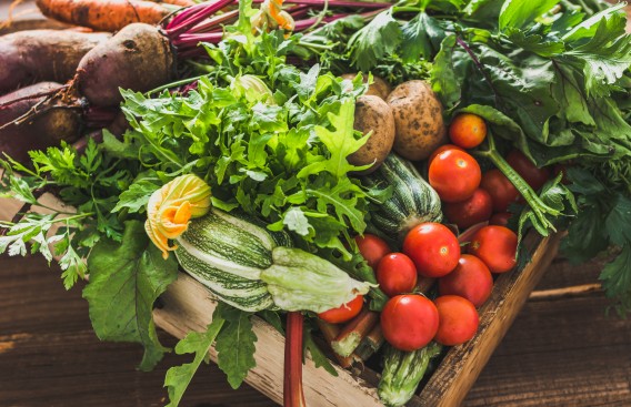 a box of vegetables and fruits