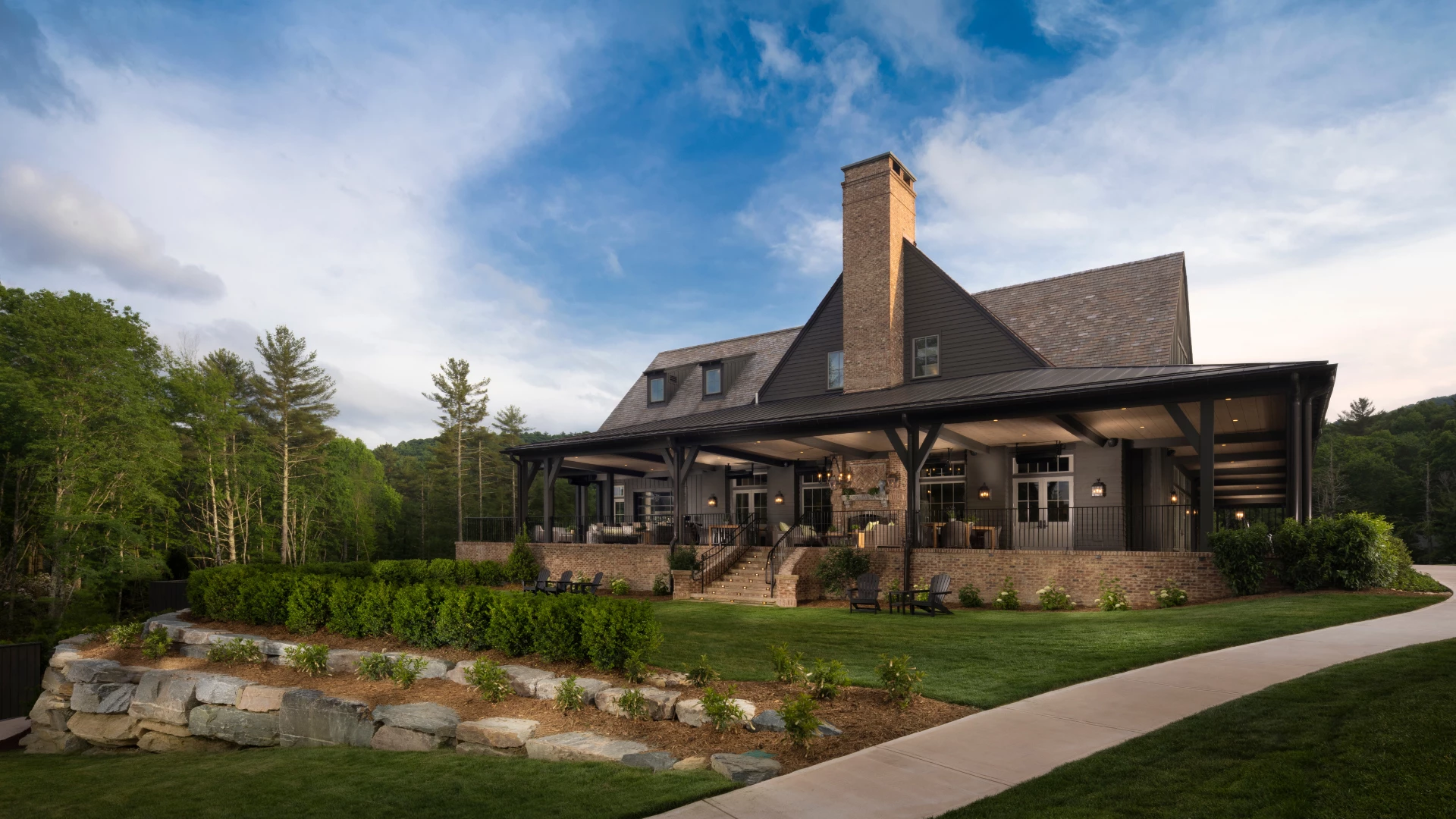 a large brick house with a large chimney