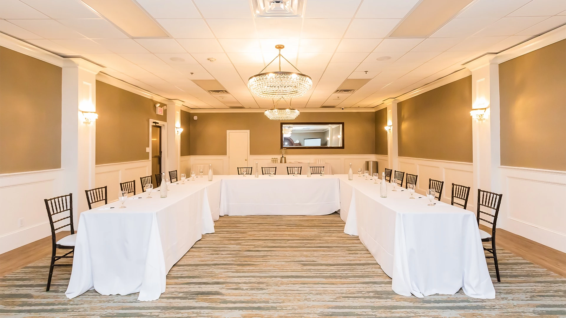 a room with tables and chairs