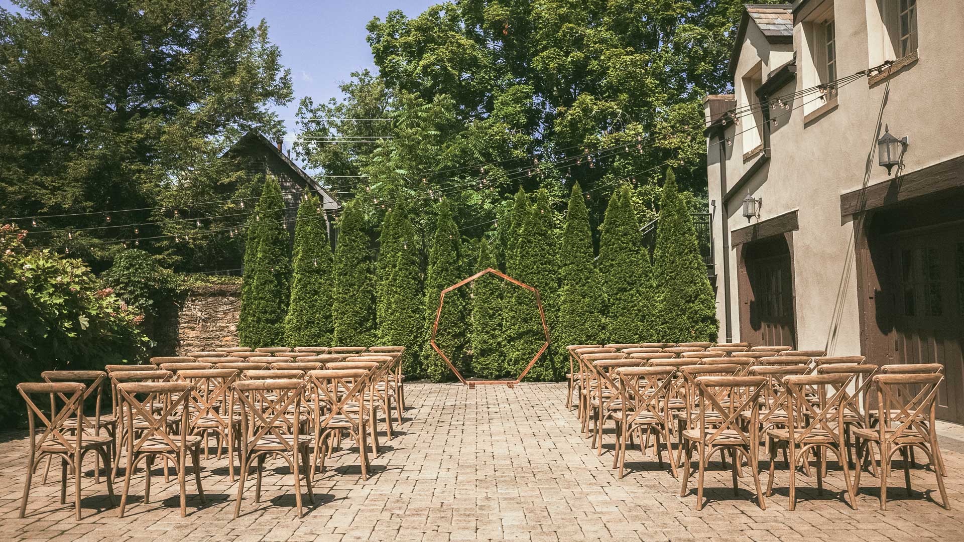 a group of chairs in a courtyard