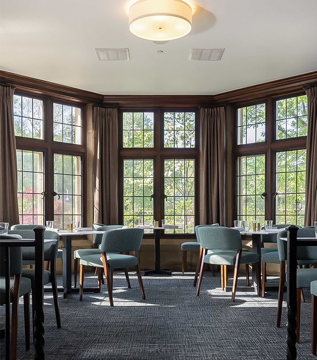 a room with tables and chairs