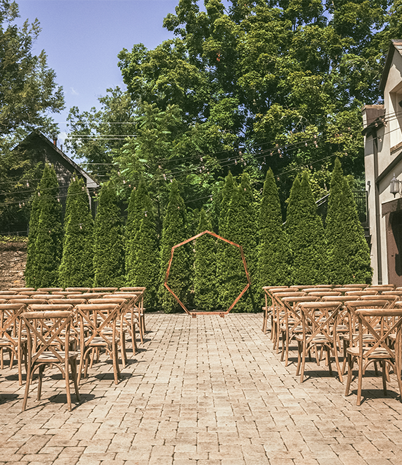 a group of chairs in a courtyard