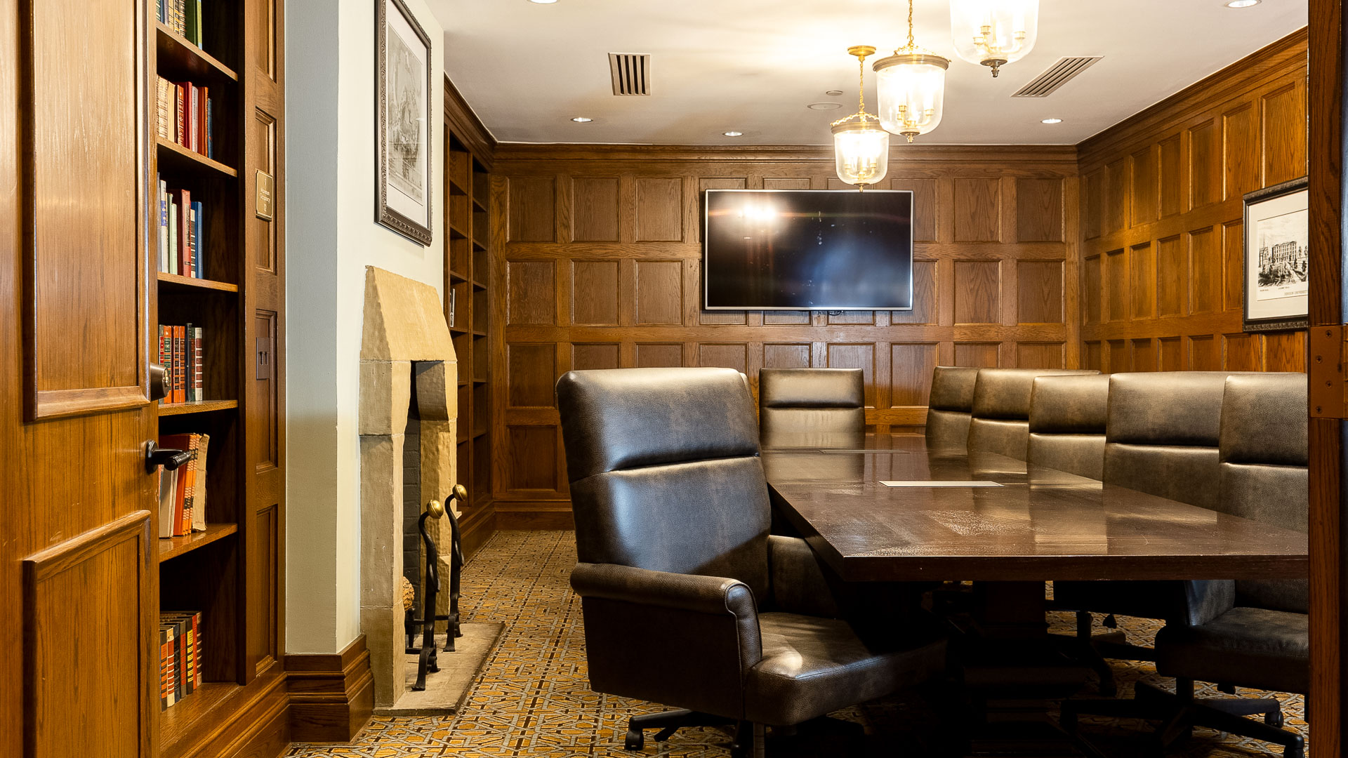 a room with a table and chairs