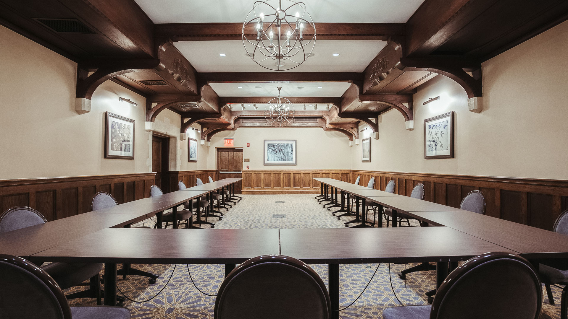 a room with tables and chairs