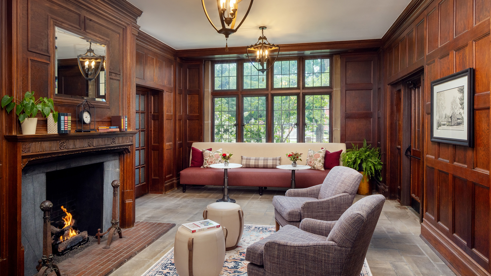 a room with a fireplace and couches