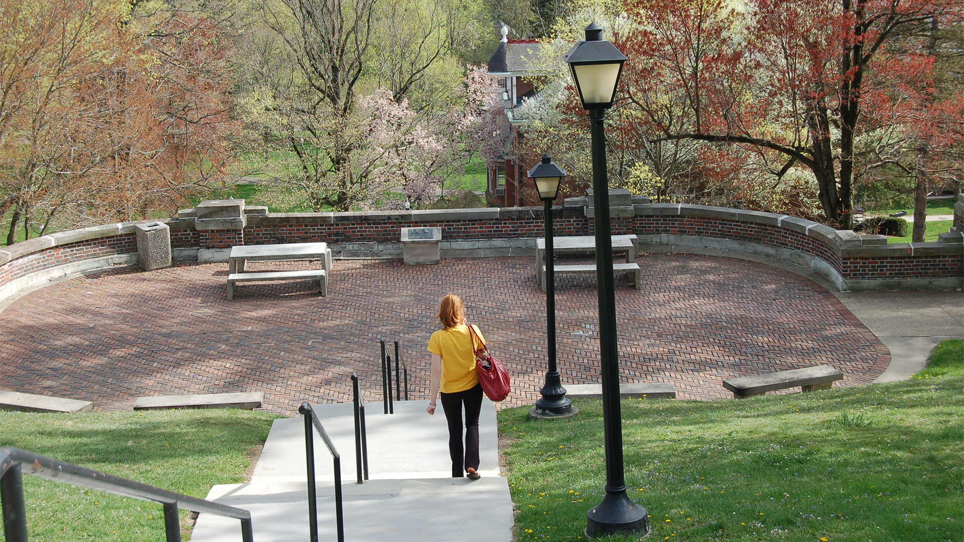 a woman walking up stairs