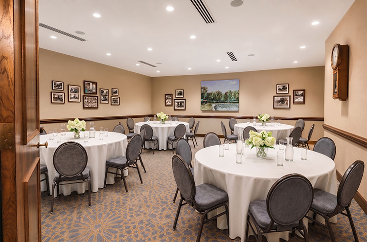 a room with tables and chairs