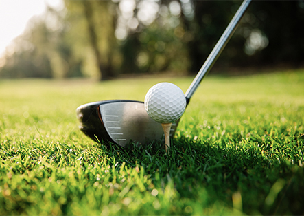 a golf ball on a tee