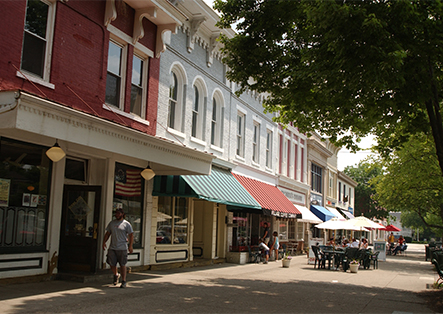 a street with shops and people