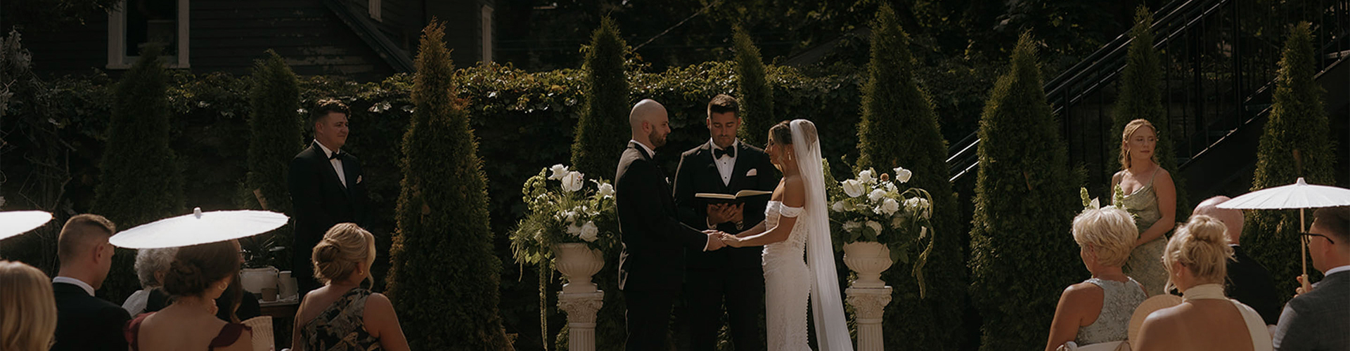 a man and woman holding hands and standing next to each other