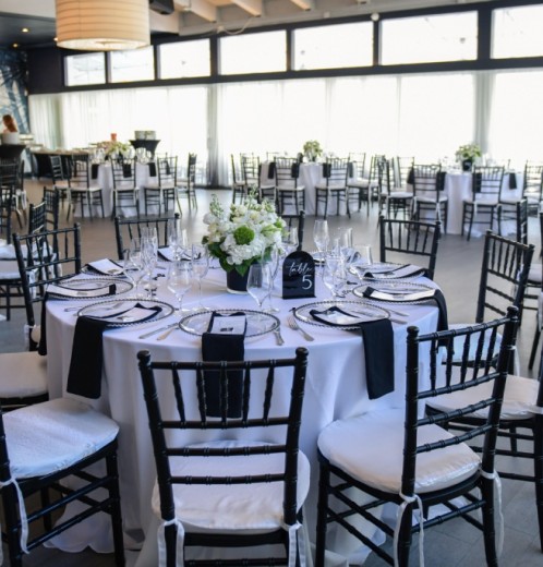a room with tables and chairs