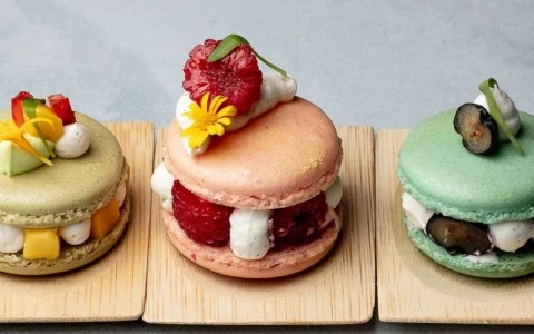 a row of colorful macaroons