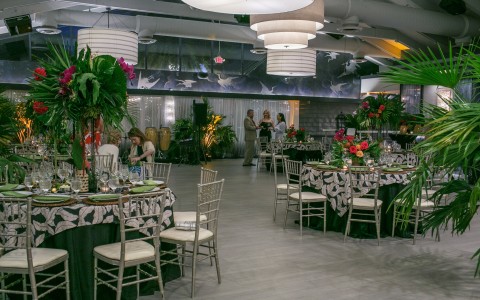 a room with tables and chairs