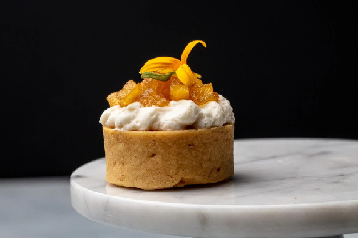 a small dessert on a marble plate