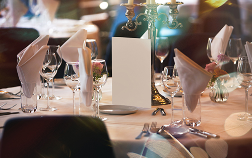 a table with plates and glasses