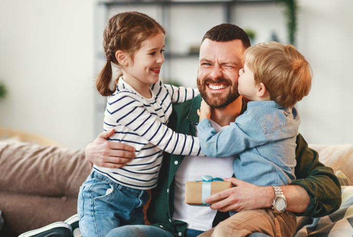 dad hugging kids
