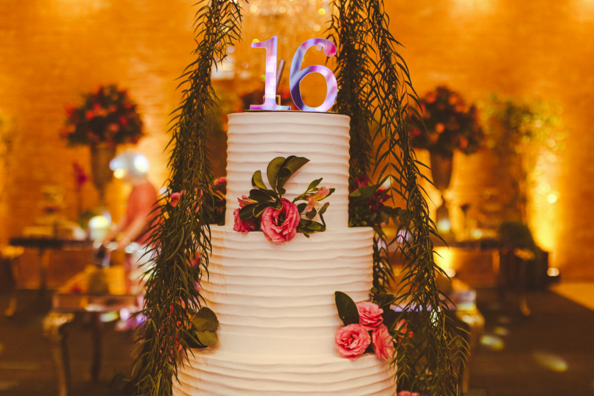 a cake with flowers and numbers on top