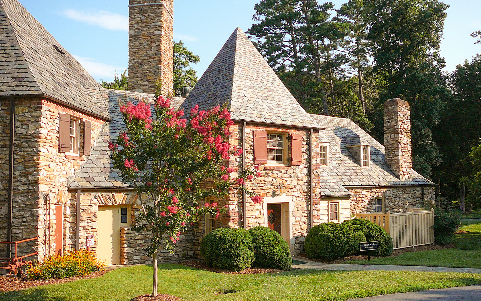 the exterior of the bernard cottage with plants 