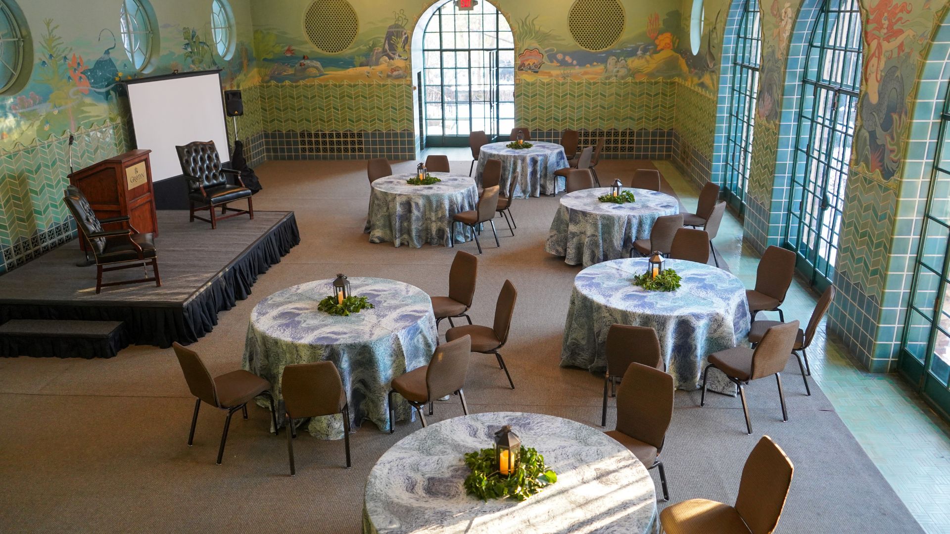 a room with tables and chairs