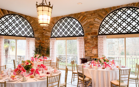 a room with tables and chairs