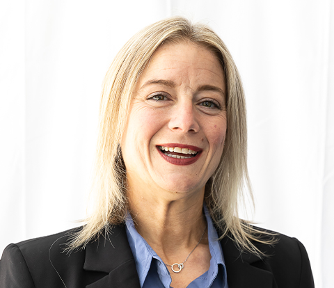 a woman smiling for a picture