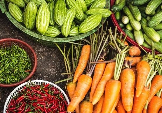 overhead shot of seasonal veggies from a market