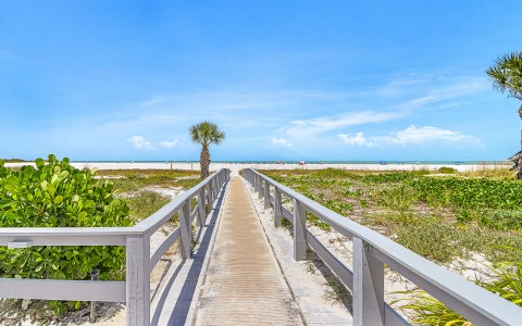 a walkway leading to a beach