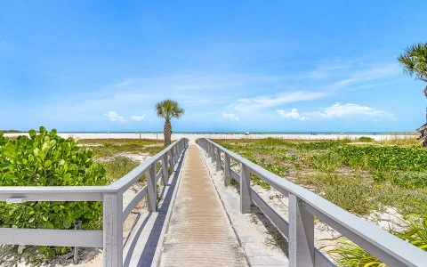 a walkway leading to a beach