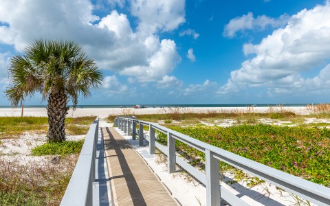 a walkway leading to a beach