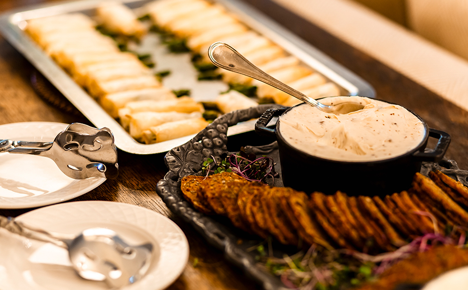 a tray of food and a spoon