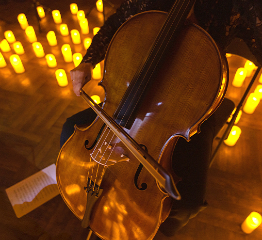 a person playing a cello