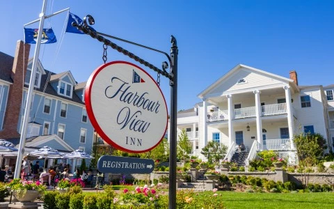 a sign in front of a hotel