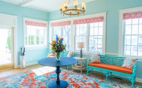 a room with a table and chairs