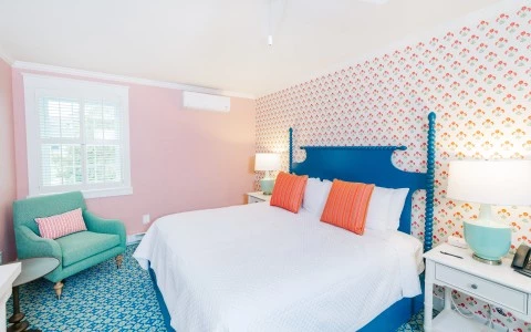 a room with a bed and a chair