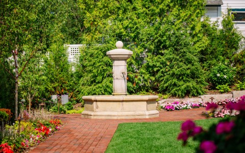 a fountain in a garden