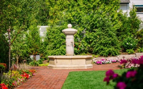 a fountain in a garden