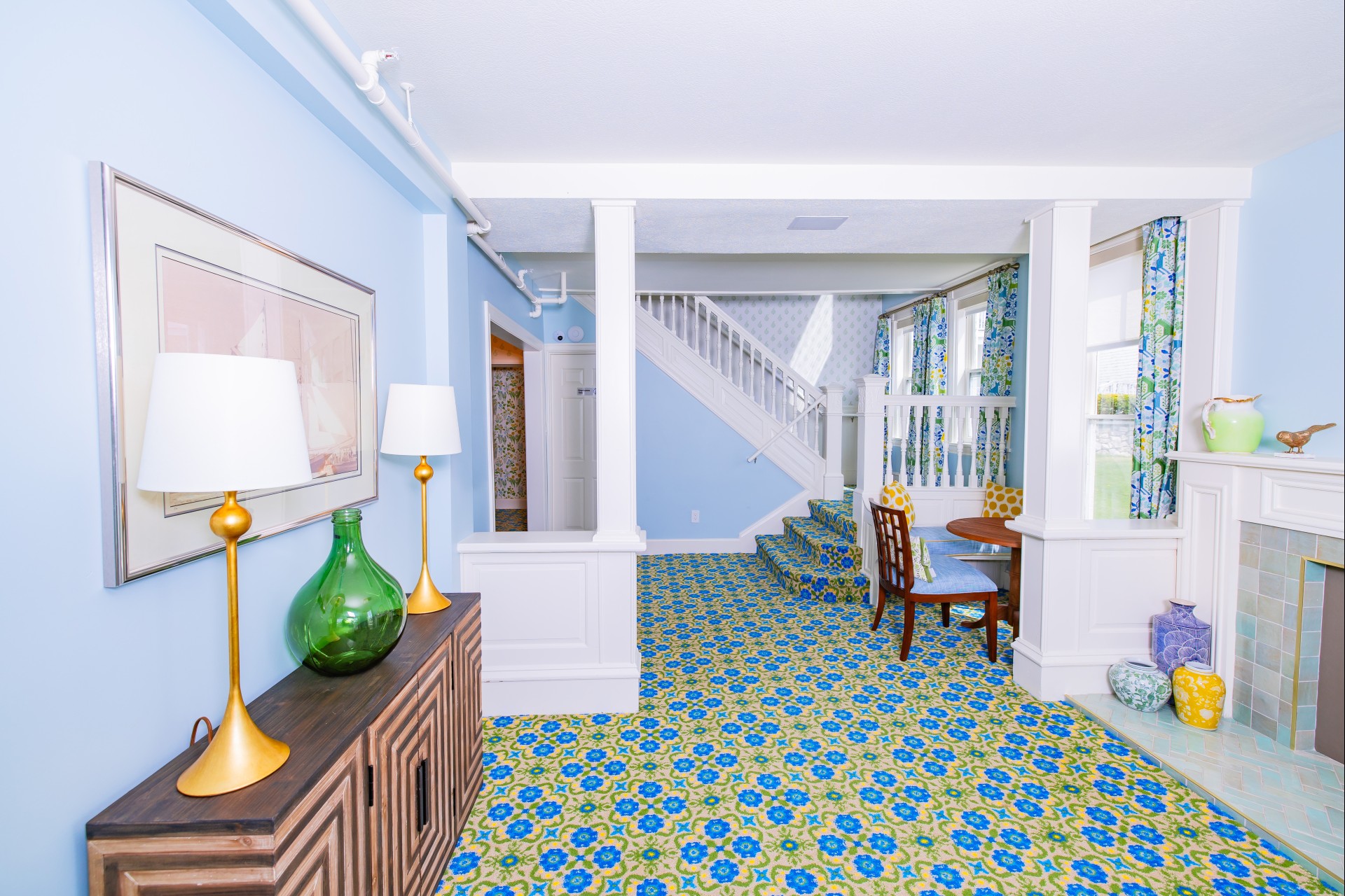 a room with a blue and yellow carpet