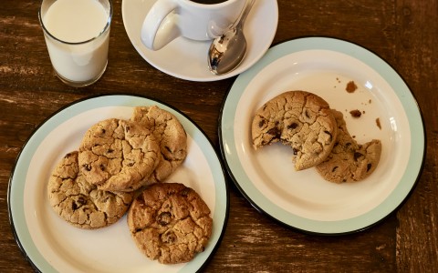 a plate of cookies and a cup of coffee