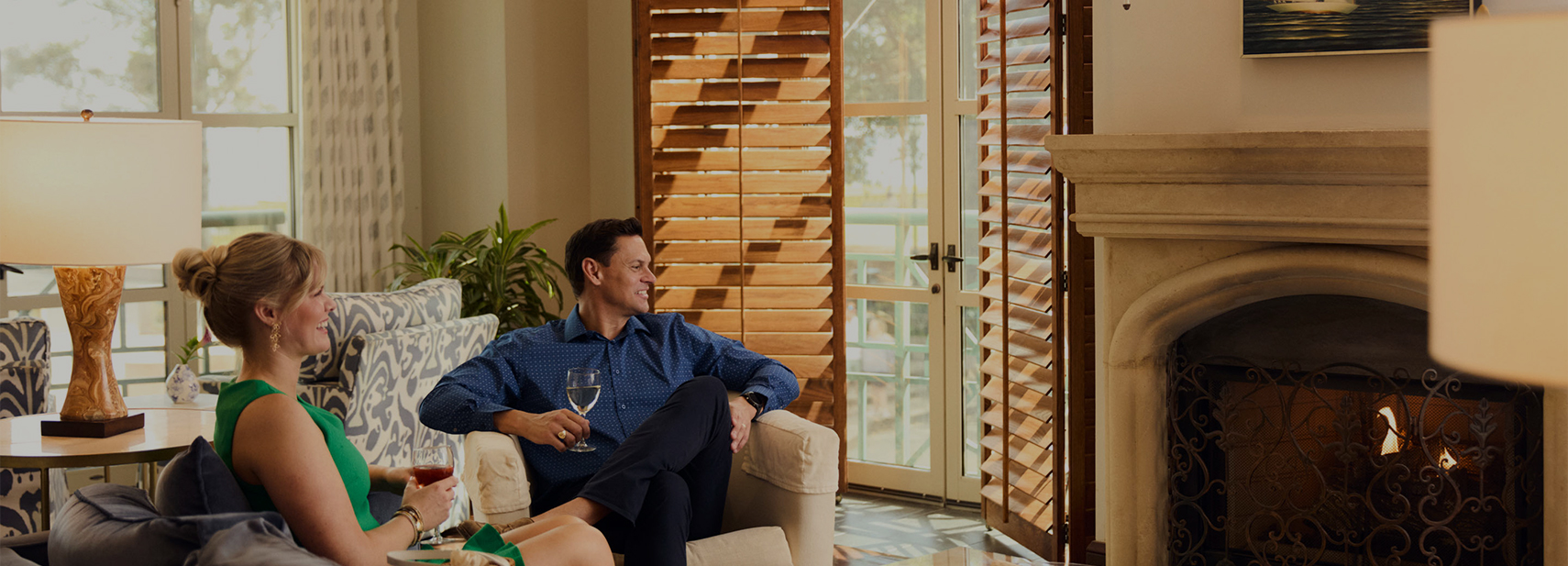 a man and woman sitting on a couch