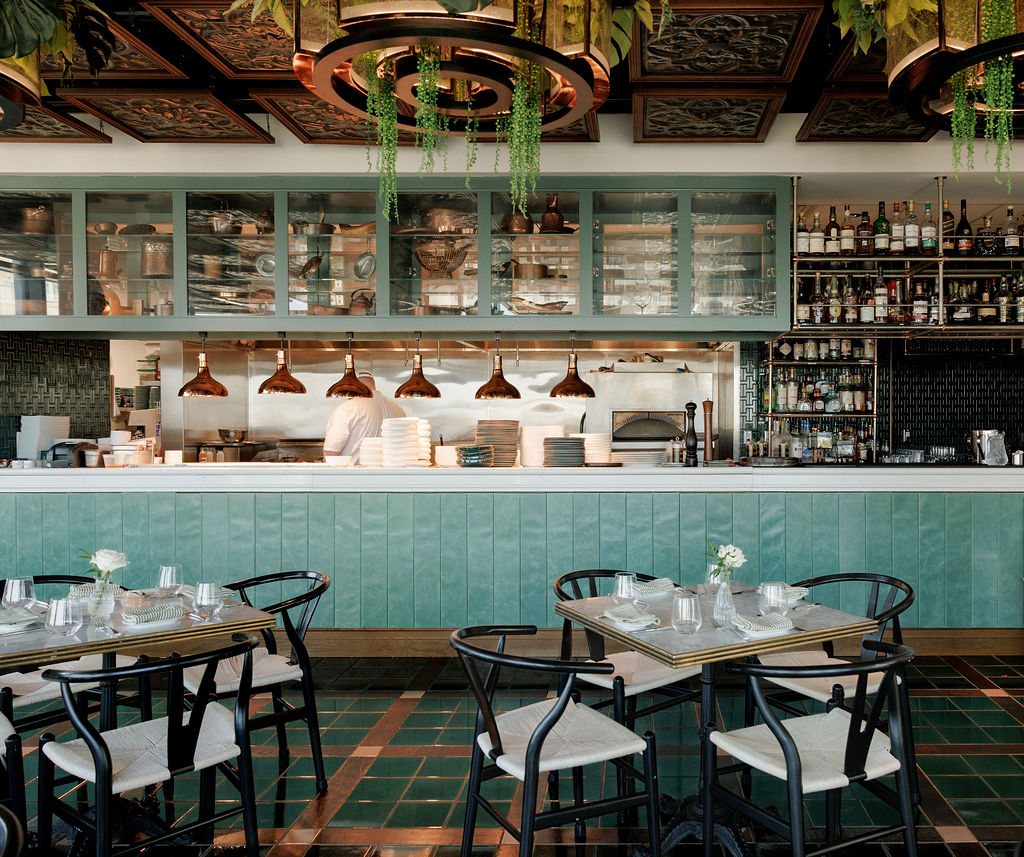 a restaurant with tables and chairs