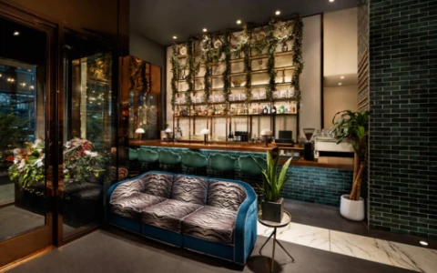 a room with a couch and shelves