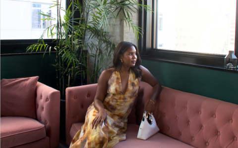 a woman sitting on a couch