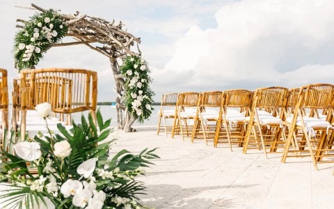 a group of chairs and tables on a deck