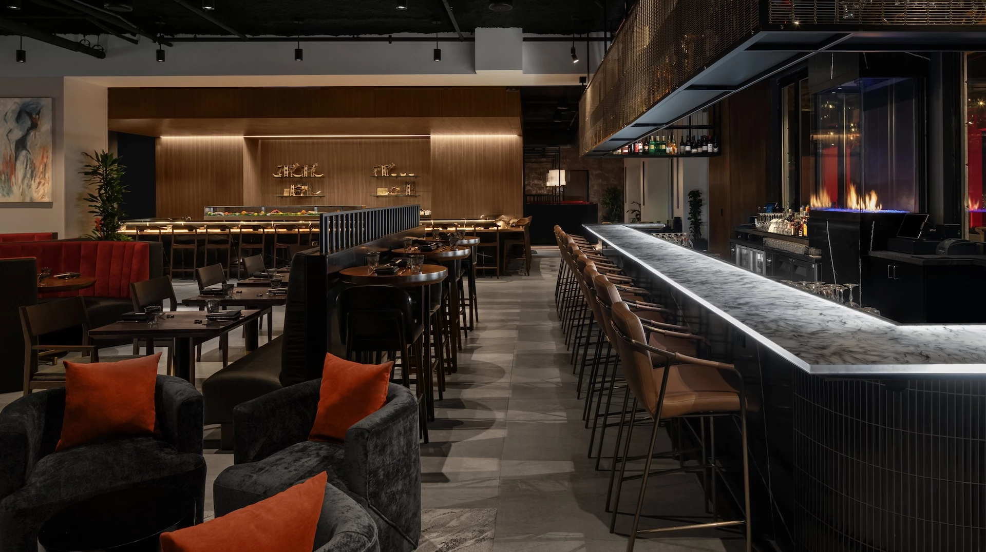 a bar with chairs and tables