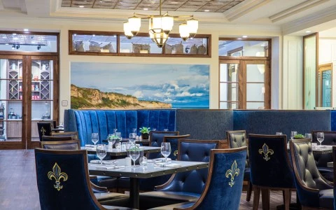 lounge with luxury tables and a wall painting 0