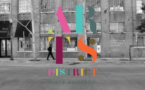 arts district new orleans text over black and white street image