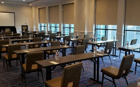 side view of meeting room with five windows and desks11