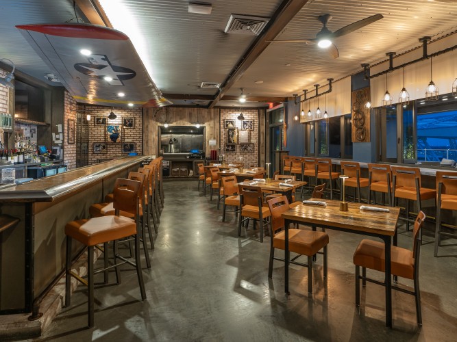 a room with tables and chairs 1